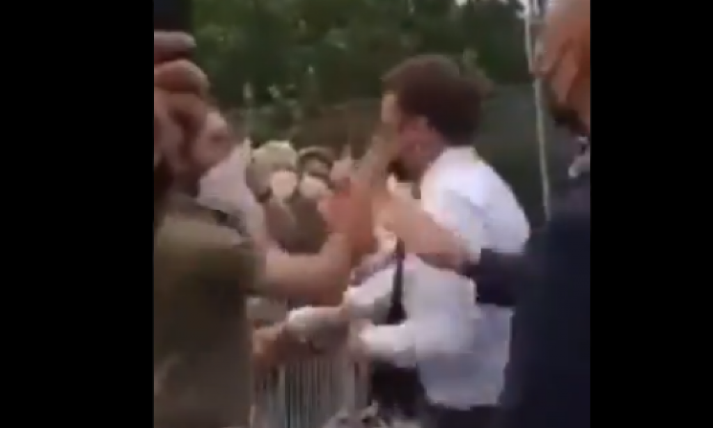 President Macron  of France  has been Slapped in the Face in  Public