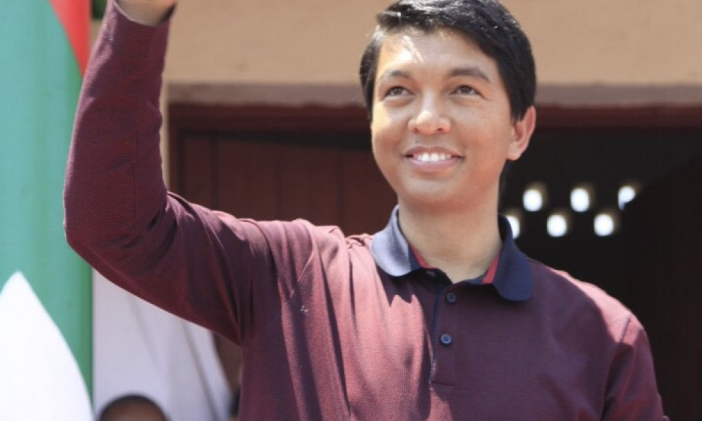 The UK has charged the top aide of the President of Madagascar with bribery.